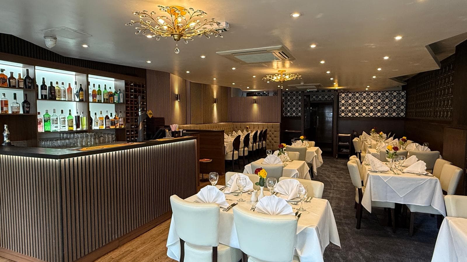 The full dining room lit up and ready for service